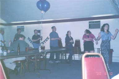 People Doing the 'train' dance - These are some people that went to my party, and they're doing the 'train' dance. With the song the 'locomotion' playing.