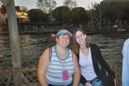 me and my cousin - This is me and my cousin on the raft at Disneyland to Tom Sawyers Island. We have our little pineapple floats from the tiki room. YUMMY I want one now! *L*