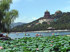 Summer Palace - Situated in the western outskirts of Haidian District,the Summer Palace is 15 kilometers from central Beijing.Containing ancient arts,it also has graceful landscape and magnificent constructions.The Summer Palace is archetypal Chinese garden,and is ranked amongst the most noted and classical gardens around the world.