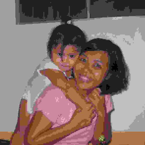 Me and my baby Tin - Me and my baby Tintin fooling around while making our first Christmas tree in 2005. Tintin was a happy 2 year-old.