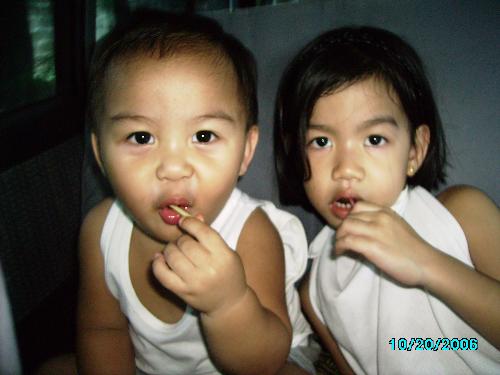 My beautiful children - I know it's not good for them. But once in a while we let them have a treat.  LOLLIPOPs. They're in the car enjoying lollipops