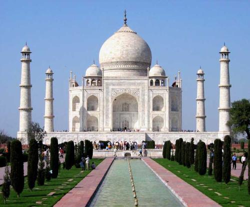 Monument of love-The Taj - Taj Mahal is a monument located in Agra, India. It was commissioned by the Mughal Emperor Shah Jahan, the son of Jahangir, as a mausoleum for his Persian wife, Arjumand Banu Begum, also known as Mumtaz-ul-Zamani or Mumtaz Mahal. It took 23 years to complete (1630 - 1653) and is a masterpiece of Mughal architecture.  The architectural complex of the Taj Mahal covers an area of approximately 580 m × 300 m, comprised of five main components: the darwaza (gateway), the bageecha (garden) which is in the form of the typical Mughal charbagh (garden divided into four parts), the masjid (mosque), the mehmaan khana (guest house), and finally the mausoleum of Taj Mahal, at the northern end of the complex.