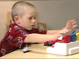 autistic child - autistic child playing with their blocks autistic child - autistic child playing with their blocks
