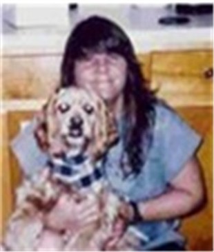 Myself and my cocker spanial, Deeogee - This picture was taking when I worked for my father who owns Hickory Acres Kennels, it has been on Angie's list 15 years in a row. He is a very hard man to work for. I pretty much look the same. Alittle heavier than I'd like, working on that. But this is pretty much me. All natural, no make up, I get far to worked up and hyper to wear make-up, plus it makes me itch. I am a true Straight Tom Boy from jump street. Don't plan on changing alot in the girly department. However I would love to lose some weight and and get smoother skin too. I'd love to have the furrow between my eyes Gone. Thats pretty much it for this moment.