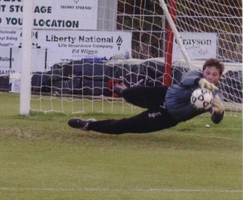 laying out for the save - Walt makes the diving save to keep his team tied at 0-0 before the half.