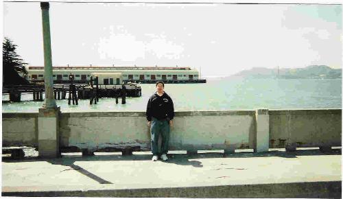 San Francisco, CA - Here is a picture of me in San Francisco a few years ago as I was visiting my sister who had gotten married then. You can see the Golden Gate Bridge in the far background.