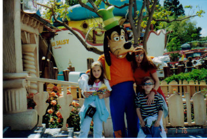 Disneyland - This was one of our trips to Disneyland. Goofy is my favorite character from my childhood. Me and 2 of my children.