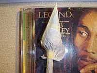 Wrap the paper lightly - Insert the weed end of the tube like joint in the end of the cone then wrap the paper lightly. Your tube should be fat enough to support the weight of the tulip. You can secure the end with seal-tape but you'll be smoking plastic