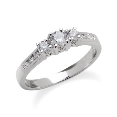 The promise ring I gave My Girlfriend - This is the promise ring I gave my girlfriend last Christmas. It has 3 'larger' Diamonds in teh middle surrounded bye 6 smaller ones. 3 on each site it is white gold and looks great with lots of sparkles