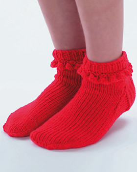 bed socks - A pair of red bed socks
