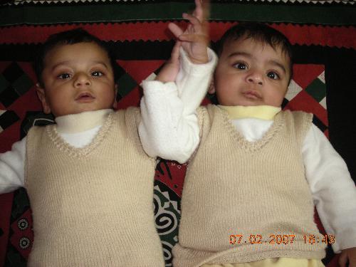 My Twins - My 5 months old twins sons playing hands together