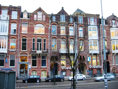 Apartments in Amsterdam - A row of apartments across the street from the Orsay Museum. This sharp style is typical of the city.