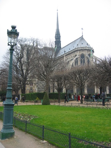 Notre Dame - The back side of Notre Dame in Paris, France. Note the flying buttresses that help support the dome ceiling.