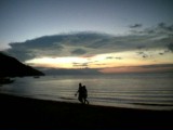 lovers at sunset - Taken at White Beach, Puerto Galera, Oriental Mindoro, Philippines last Sunday evening, February 18, 2007. Puerto Galera is sooo beautiful!
