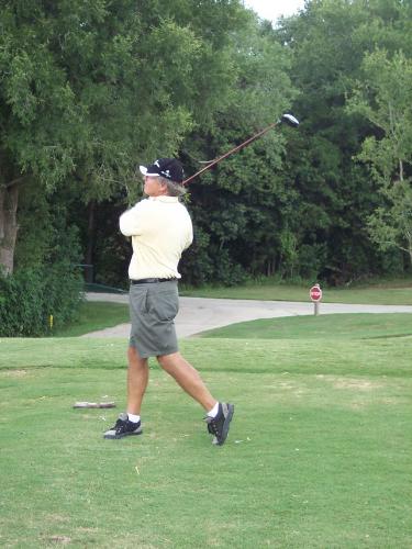 my dad at his finest - he loves golf, I love this photo of him playing