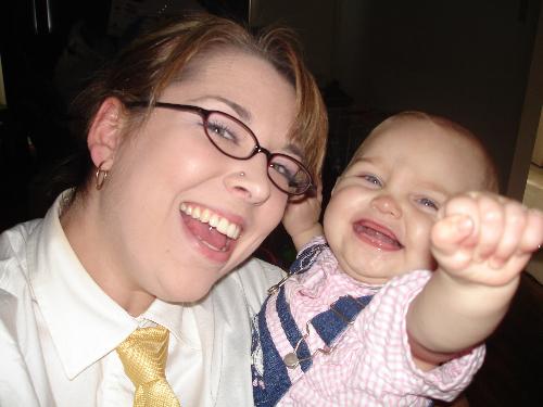 My beautiful daughter and granddaughter - My daughter ready for work. She is getting ready to drop the baby to Nanny (me)