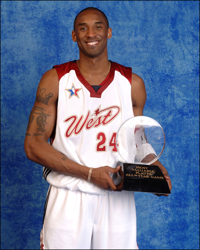 Kobe Bryant with the Most Valuable Player Award - Finally, Kobe Bryant get this award for the second time in his 10 years career.