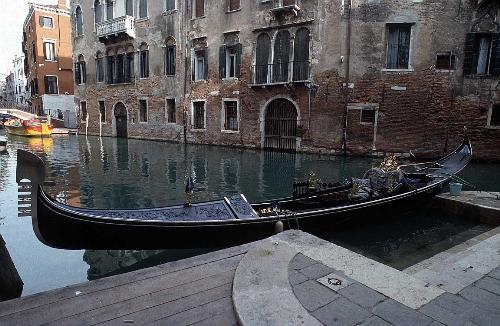 Gondola Ride - This is a picture of a gondola, an Italian (Venetian) style of a boat, much like a canoe.