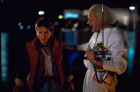 Back to the future - Doc is showing his time travelling car to Marty while he is confused and surprised