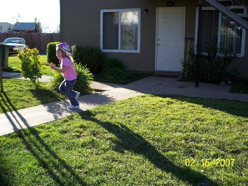 My daughter enjoying the 1st 75 degree day - This was taken on Friday Feb 16, 2007 our first warmest day of the year. It was gorgeous at 75 degrees.