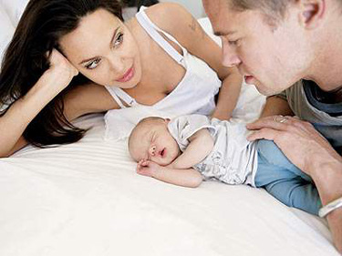 Brangelina - Brad and Angelina Jolie with their kid.