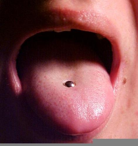 Tongue piercing - photo by Wickamedia Commons