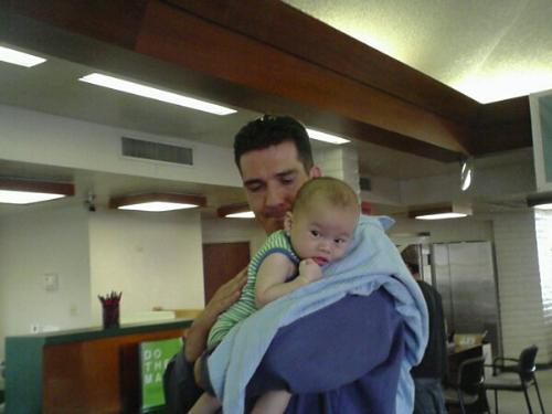 Father and son outing - Hubby, bubby and I were out and about one day and I handed him the baby since I was tired of holding him all the time. Judging by this photo, I think bubby was getting tired.