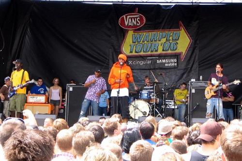 my sis and Gym Class Heroes - My sister on stage with the band Gym Class Heroes at the Vans Warped Tour 2006.