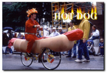 Hot Dogs - Person selling some hot dogs on hot dog bicyle.