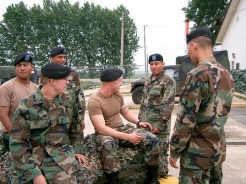 Soldiers working hard - Soldiers taking a rest from working