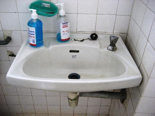 Tap. - A wash basin.