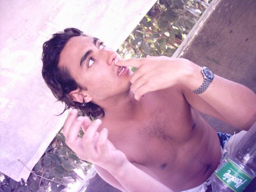 What tha..... - Taken in Puerto Galera, Talipanan Beach. He was looking and observing the people. This is how he looks. Hahahaha! :D  Love you Nico.. :P