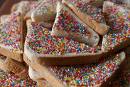 Fairy Bread - This is a party favourite, particularly with this age group.

To make Fairy Bread all you need is:

1 loaf white bread
1 packet 100s & 1000s
Butter, Maragrine or Nutella (or any other chocolate bread spread

Spread butter on bread, sprinkle with 100&#039;s and 100&#039;s and enjoy.
You can cut the crusts off, and slices into triangles or squares or even use cookie cutters to create fun shapes in your bread. Sprinkles can be rainbow colours or you can use individual colours to make the perfect fairy bread. 
