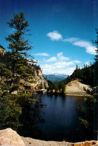 View of Painted Rocks Reservoir - This is a view of Painted Rocks Reservoir in Montana. This reservoir is part of Painted Rocks State Park and the reservoir itself is a tributary of the West Fork Bitterroot River.  Painted Rocks State Park is located in the Bitterroot Mountains and is south of Hamilton, Mt. The park is a popular place for boating, fishing, hiking and camping.