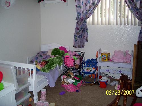 Daughters room - This is the 3 year olds room it was completely organized this morning when she woke up and mow it's a mess again.