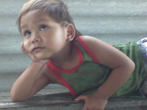 Orphan - he is not my child but my neighbour child i want to be its foster father bright, humoris, and always smile although he ignore the who is its father but I love him
