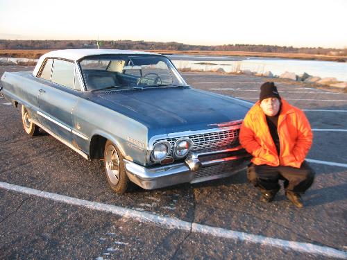 Impala 63 - Our awsome antique ride. Belongs to my husband. He is the guy in orange.