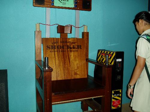 eletric shock - Ignore the others but that brown wooden chair that stated 'the original SHOCKER electric chair'.Want to experience an electric shock? Come down to Singapore science centre.Don't know that other place got such things too.YOu just have to sit on the wooden chair specially created for everyone to try.Hold the silver thing with both your hands thightly.VERY TIGHT IS GOOD!Thats where you will feel the shockness.Current will flow through your body and if you are lucky,You will be safe.If not,maybe you will fainted or BYE BYE you go.BY the way,a $0.50 cent coin is needed in order for you to make it happen.Let sit back,relax & ENJOY! LOL!!!!