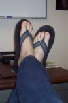 Flip Flops - A picture of feet wearing flip flop shoes