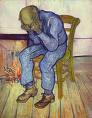 depression - Photo of man in rocking chair with head down holding it in his hands.