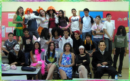 Classmates during 'purim' day. - yeah, purim day, stupid day indeed with no meaning.  'Purim (Hebrew: ????? Pûrîm 'lots', from Akkadian puru) is a joyous Jewish holiday that commemorates the deliverance of all the Jews at the time who were living under the authority of the Persian Empire, resulting from the Babylonian captivity (after Persia had conquered Babylonia), from Haman's plot to exterminate them, as recorded in the Biblical Book of Esther. It is characterized by public recitation of the Book of Esther, giving mutual gifts of food and drink, giving charity to the poor, and a celebratory meal (Esther 9:22); other customs include drinking alcohol, wearing of masks and costumes, and public celebration.  Purim is celebrated annually on the 14th of the Hebrew month of Adar. (In cities that were walled in the time of Joshua, including Jerusalem, Purim is celebrated on the 15th of the month, known as Shushan Purim). As with all Jewish holidays, Purim begins at sundown on the previous secular day.'  from wikipedia. all rights reserved to wikipedia.