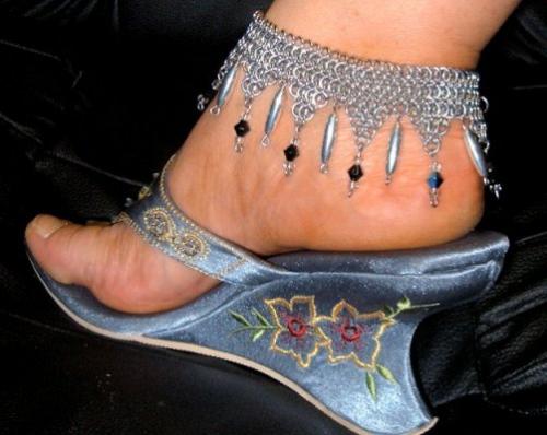 Anklet - Along with sculpting I also dabble in jewelry design. This is an anklet I designed with a chain mail technique and some glass and silver beads.