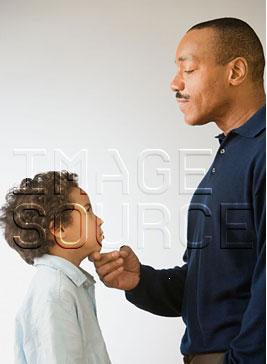 father scolding son - son fears to say a word