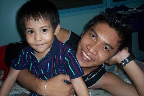My brother and some kid :) - A cute one and a big used to be cute one teehee