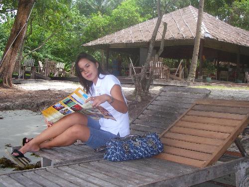 bintan adventure - studying the map of bintan island, indonesia 2007