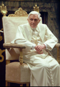 Pope - The Pope (from Latin: papa, Papa, father; from Greek: pappas/ p?ppa?, father)[1] is the Bishop of Rome and the spiritual leader of the Roman Catholic Church. He is believed by Catholics to fulfill this role as the Successor of Saint Peter, making him Vicar of Christ. The office of the Pope is called the Papacy; his ecclesiastical jurisdiction is called the Holy See (Sancta Sedes in Latin) or Apostolic See (this latter, on the basis that both St. Peter and St. Paul were martyred at Rome). Early bishops occupying the See of Rome were designated Vicar of Peter; for later Popes the more authoritative Vicar of Christ was substituted; this designation was first used by the Roman Synod of 495 to refer to Pope Gelasius I, an advocate of papal supremacy among the patriarchs. Marcellinus (d. 304) is the first Bishop of Rome whom sources show used the title of Pope. The current Pope is Benedict XVI. In addition to his service in this spiritual role, the Pope is also Head of State of the independent sovereign State of the Vatican City, a city-state and nation entirely enclaved by the city of Rome. Before 1870 the Pope's temporal authority extended over a large area of central Italy: the territory of the Papal States. The Papacy retained sovereign authority over the Papal States until the Italian unification of 1870; a final political settlement with the Italian government was not reached until the Lateran Treaty of 1929.