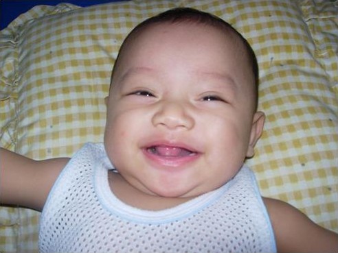 he's so handsome - at his age of five months, he more cute than i could ever imagine. i luv you so much eric:D from..mummy
