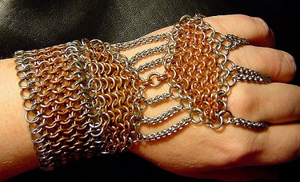 Demiglove - This is a demiglove I made for our drummer. It's made of stainless steel and copper wire.