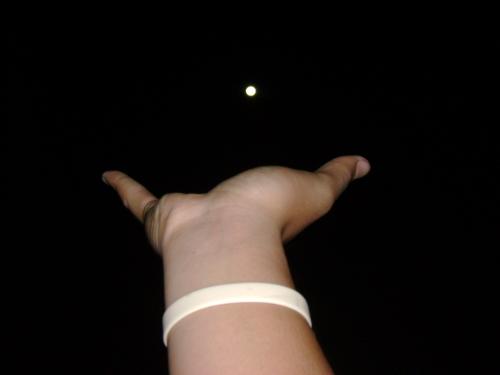 The Moon in my hand! - See how small the moon is?