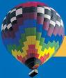 hot air balloon - A hot air balloon flying high on a cool sunny day